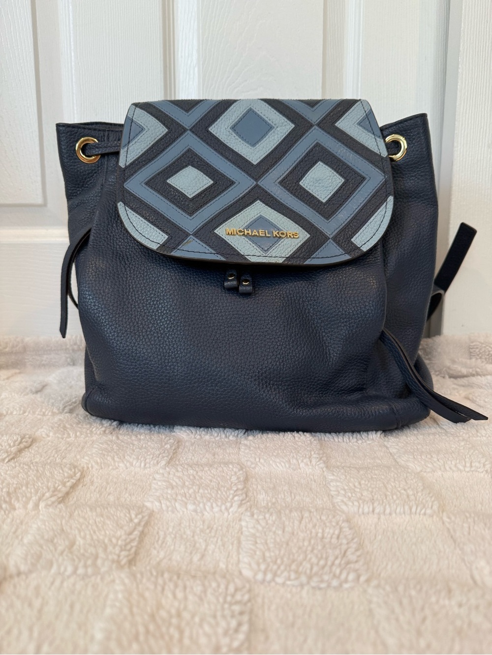 Michael Kors Navy Leather Backpack with Geometric Light Blue Flap